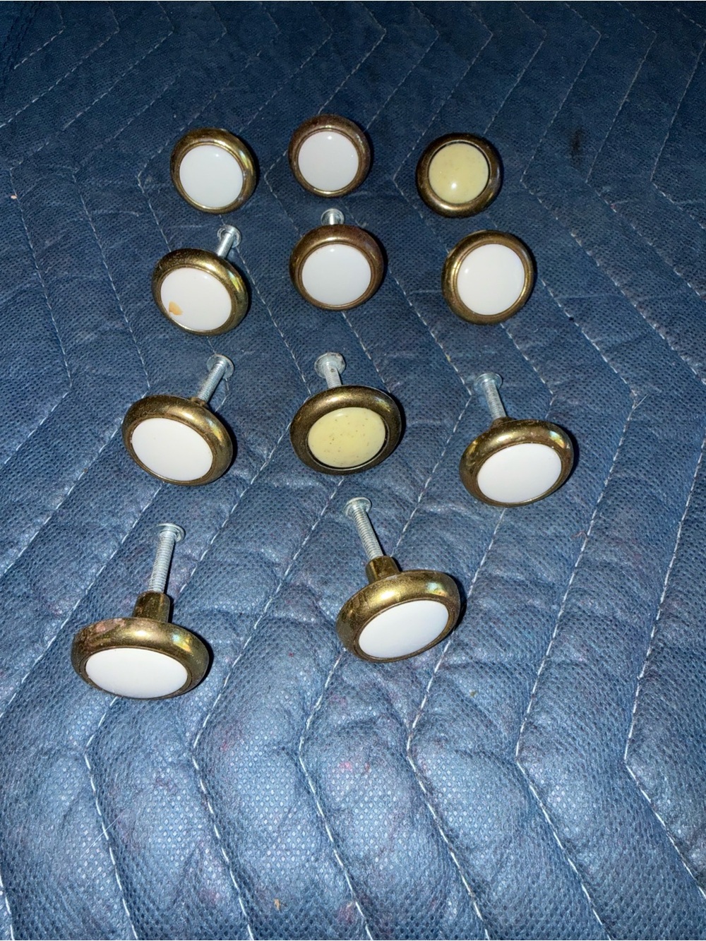 Set of 11 White and Brass Cabinet Knobs